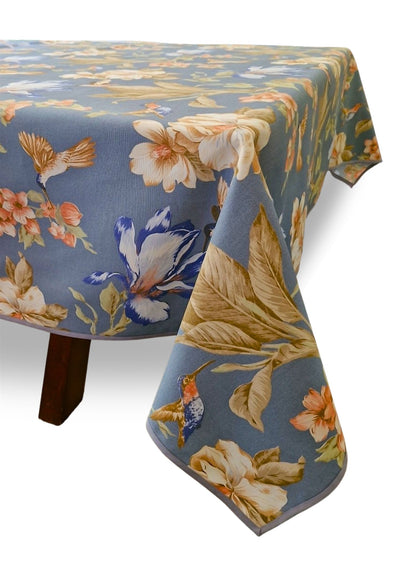 Estampado picaflor azul sobre fondo verde menta, mantel repelente Tischdecke