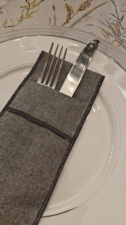 Detalle del tejido de lino marengo con costura reforzada
